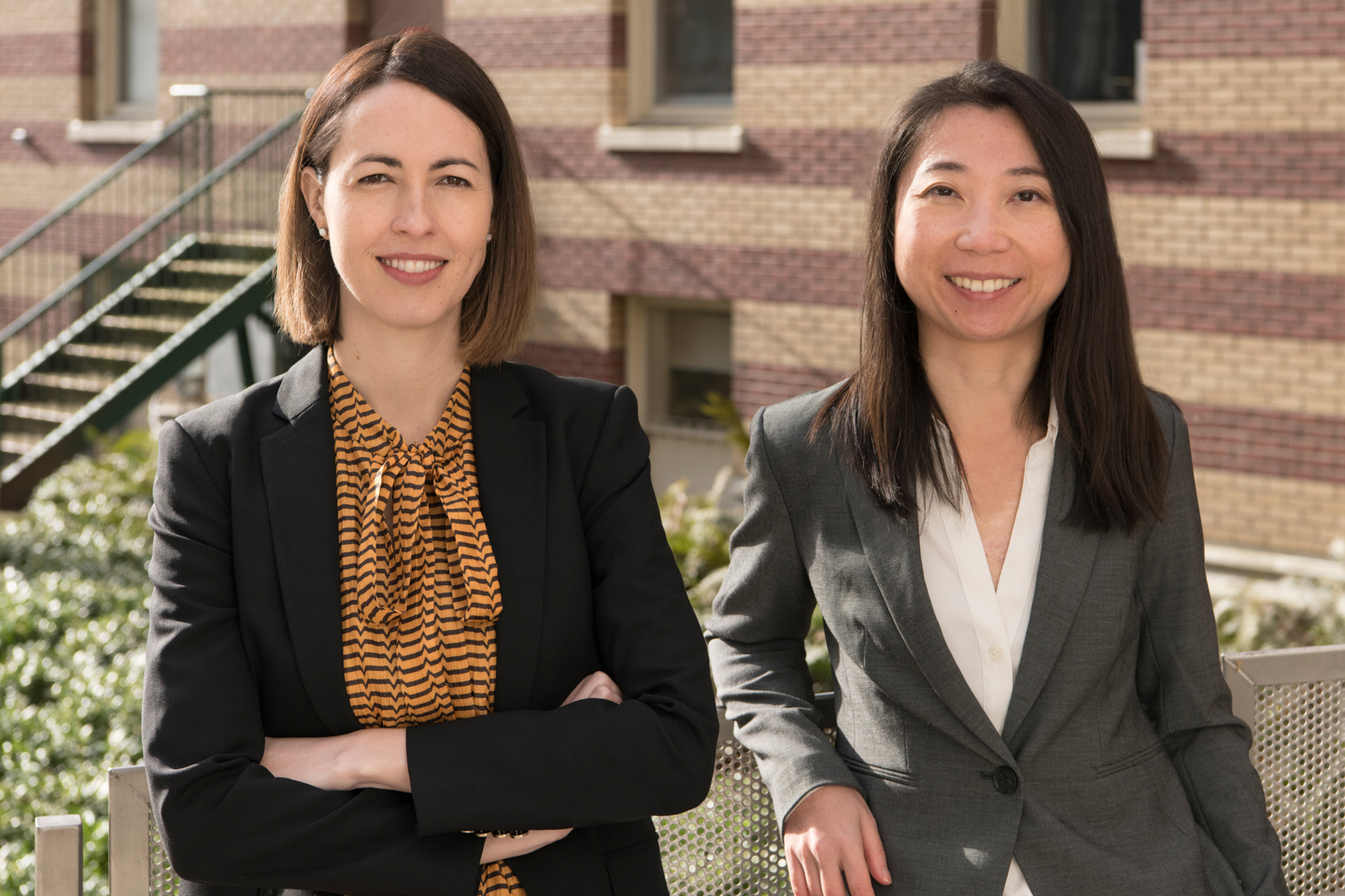 Dr. Nadia Fairbairn and Dr. Ying Wang standing side by side