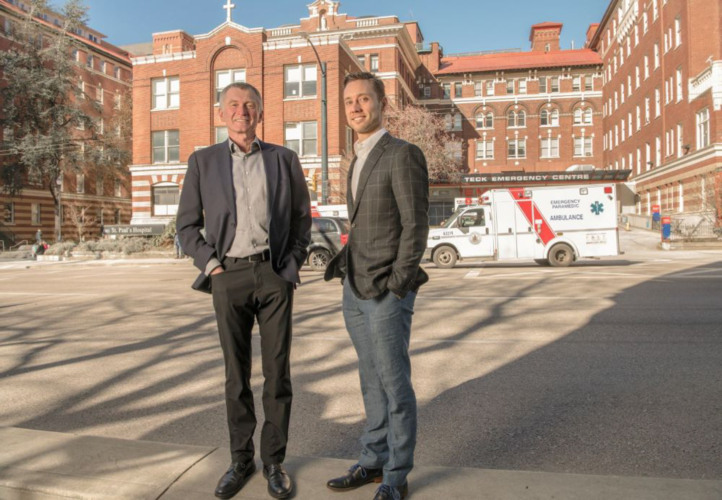 Drs. Jim Christenson and Brian Grunau stand outside of Teck Emergency Centre at St. Paul's Hospital.