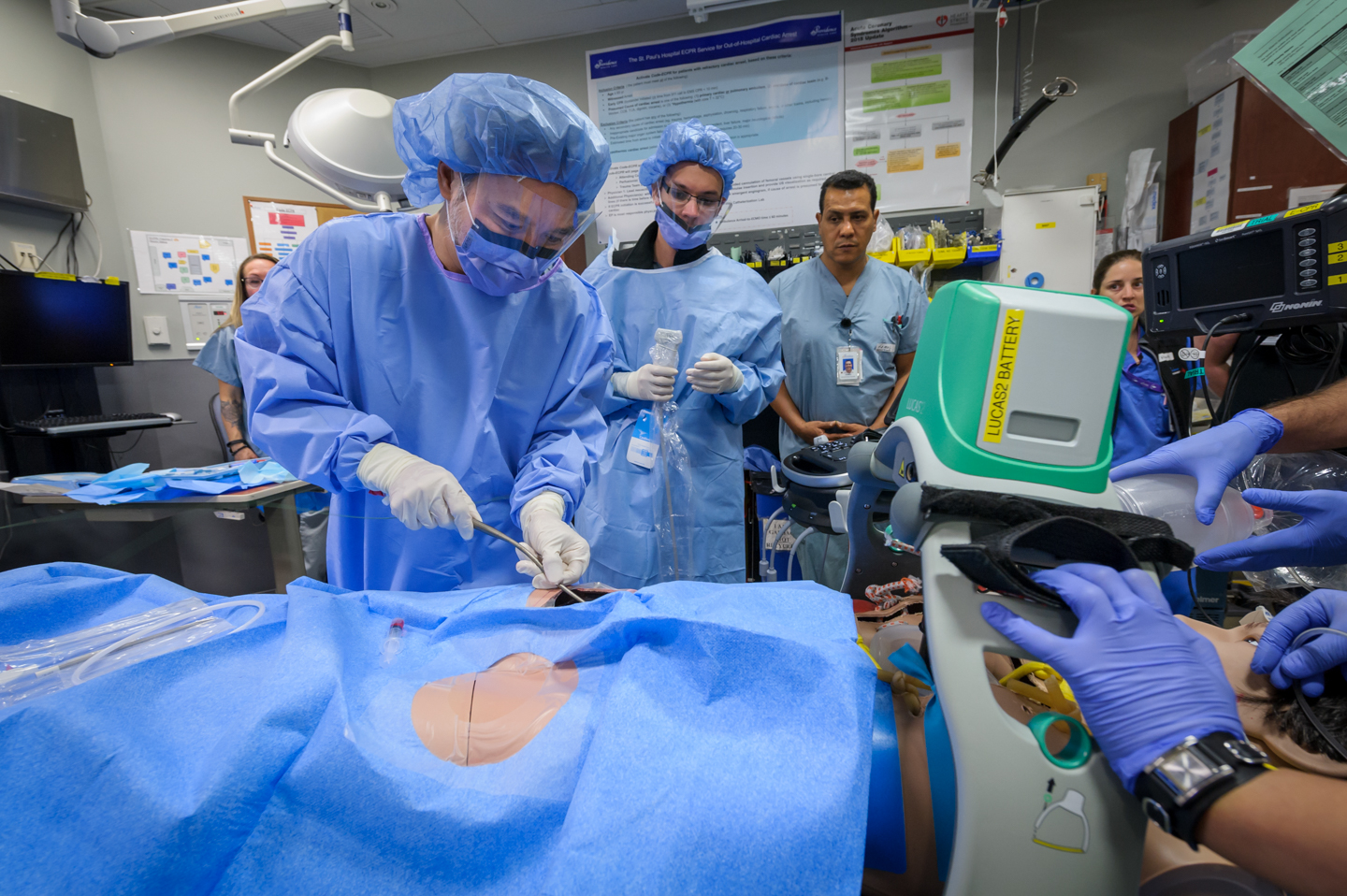 A doctor performs ECPR simulation procedure.