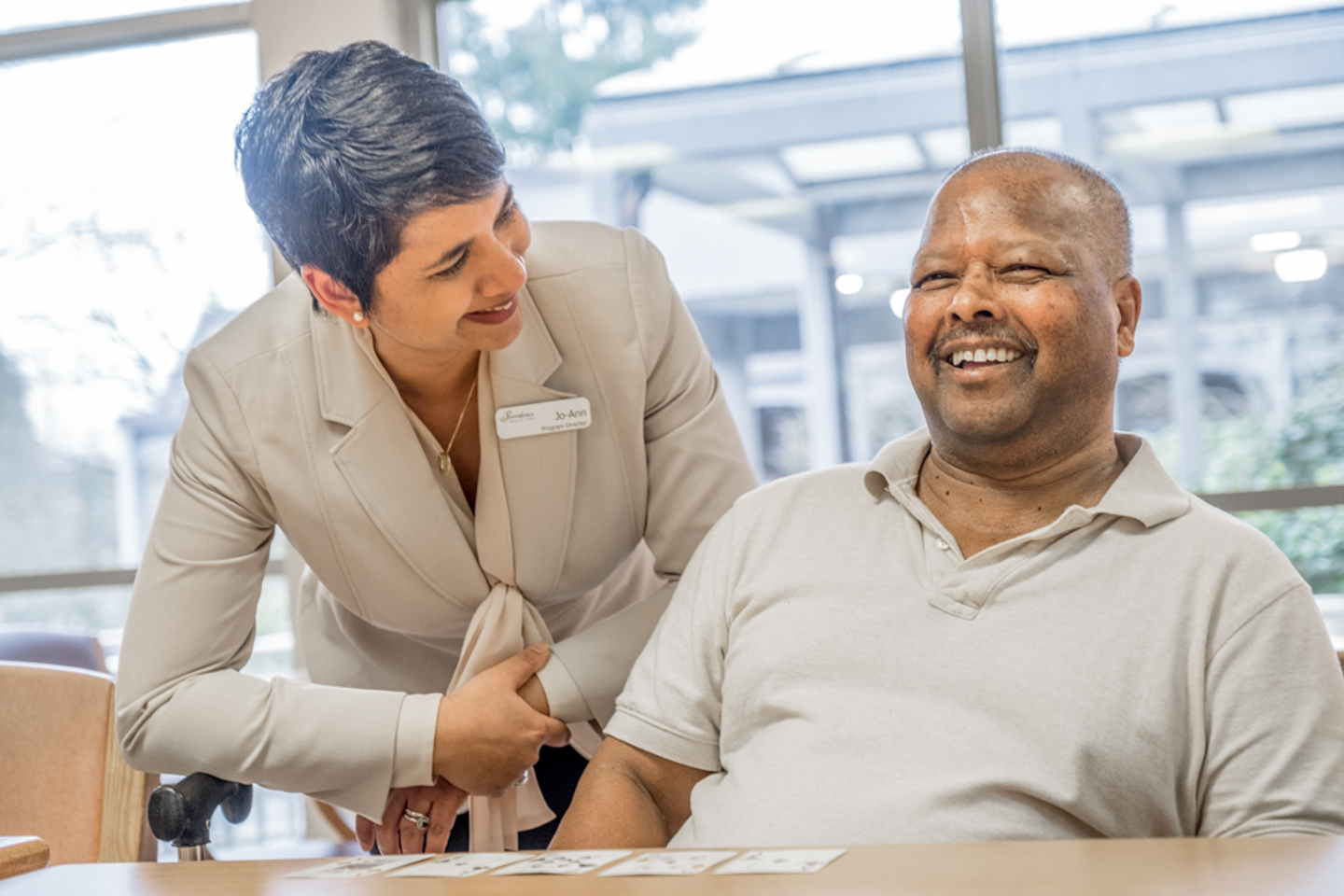 Jo-Ann Tait with Youville resident Suseesh.